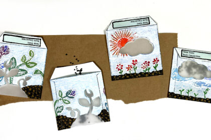 image of 4 handmade paper seed packs with hand painted floral designs on them