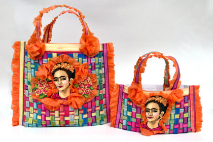 image of 2 colorful tote bags woven with paper and adorned with art of frida kahlo