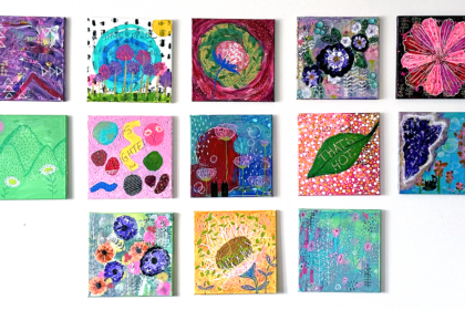 image of a gallery wall of square abstract paintings in many colors