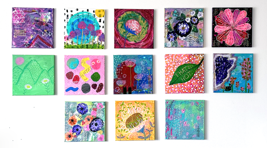 image of a gallery wall of square abstract paintings in many colors