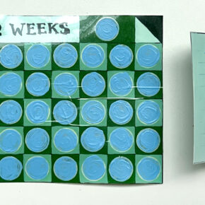 image of DIY scratch-off cards, on the left is a big card in blue ahnd green tones representing weeks of the year, and on the right is a small booklet with a similar grid to represent 1 week out of the year