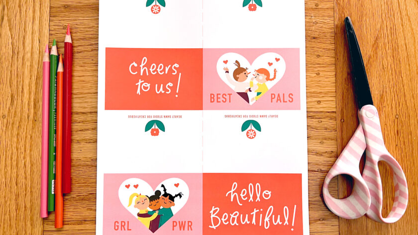 image of materials needed to make a cute Galentine's Day printable card: print-out of PDF art, scissors, and colored pencils